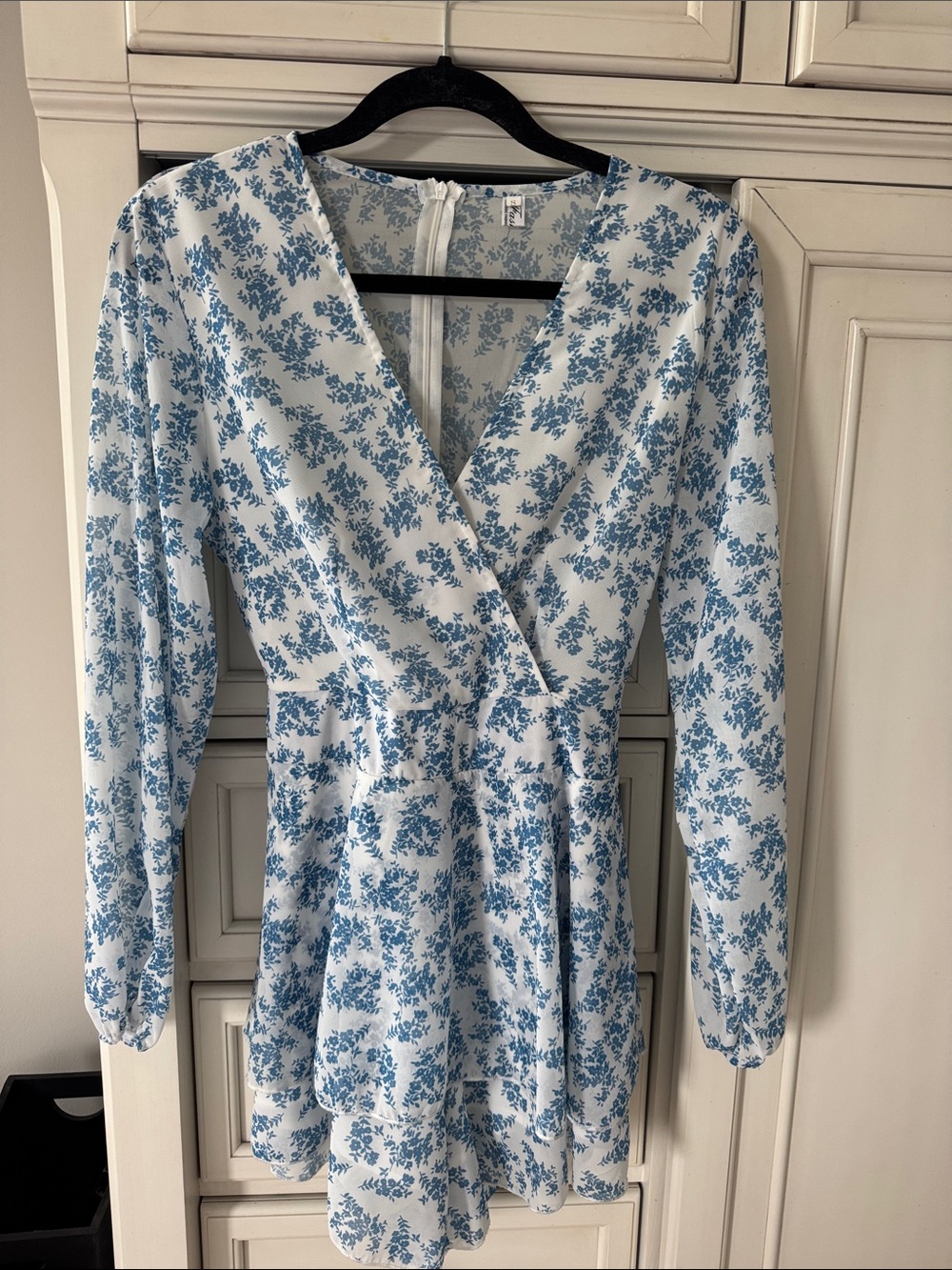 Women's Blue Floral Wrap Romper with Long Sleeves